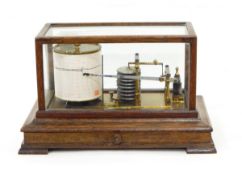 Aitchison & Co barograph to HM Gov London, oak cased and glazed with frieze drawer to base,