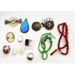 Assorted costume jewellery including a silver buckle with shell decoration,