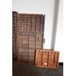 A set of wooden specimen shelves made from printers drawer and another,