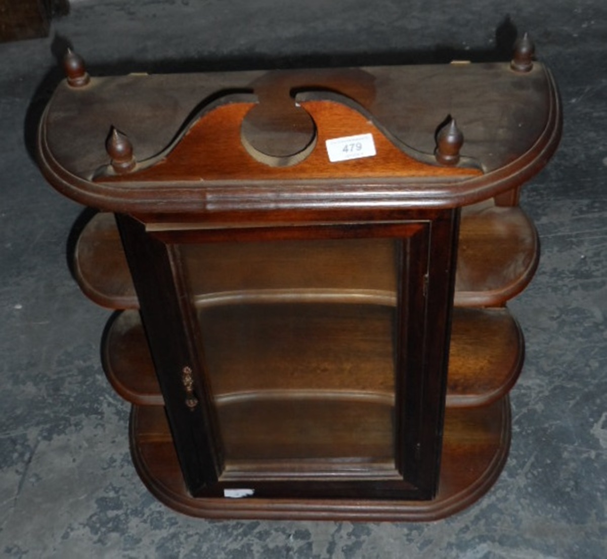 A modern mahogany collectors display cabinet