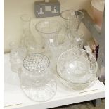 A large quantity of cut glass including vases, jugs, fruit bowls, etc.