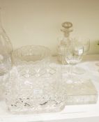 A cut glass bowl of square form, another circular cut glass bowl with scalloped edge,