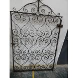 A cast iron gate with scroll pattern,