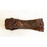 An ancient iron axe head with loop