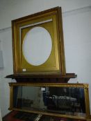 A 19th century gilt picture frame of rectangular form with laurel leaf moulding,