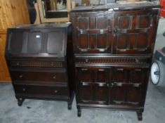 A reproduction stained oak bureau,