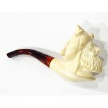 A carved meerschaum pipe