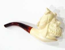 A carved meerschaum pipe