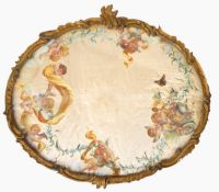 One framed painting on silk of cherubs in a chariot drawn by butterflies, in an oval gilt frame,