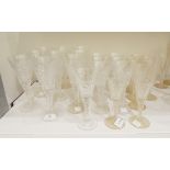 A suite of Stuart cut glass comprising three graduated sizes of drinking glasses,