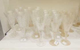 A suite of Stuart cut glass comprising three graduated sizes of drinking glasses,