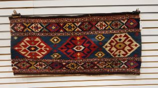 An Anatolian Kelim bedding bag face with red and cream medallions,