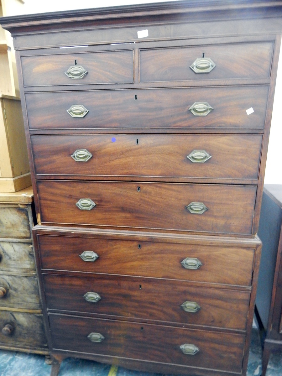 A 19th century mahogany tallboy with two short and six graduated drawers, on shaped bracket feet,