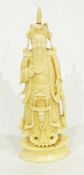 A Chinese carved ivory chess piece of a Samurai warrier (some damage to head dress),