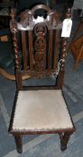Oak early 19th century dining chair, with floral top rail,