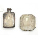 A small silver hip flask,