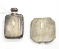 A small silver hip flask,