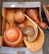 A quantity of African gourd vessels, vases, instruments and similar,