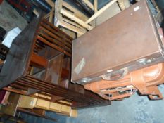 A 20th century mahogany rotating magazine rack,
