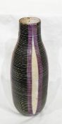 A Swedish Upsal-Ekeby pottery vase with linear decoration in bands of green, purple and black,