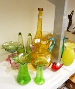A Victorian cranberry glass bowl, a pearlised vase of lobed form, a pair of green flash cut bottles,