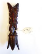 An African Warega carved hardwood double-sided figure group on pointed petal base,