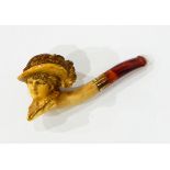 A Victorian carved meerschaum pipe, the bowl in the form of lady wearing large feathered hat,