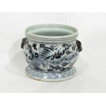 A Chinese porcelain two-handled bowl decorated with a dragon and phoenix, 12.