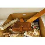 A bakelite handled manicure and travelling vanity set in folding leather case,