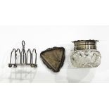 A small silver four-division toast rack,
