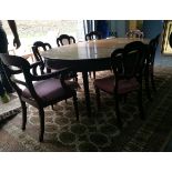 A mahogany D-end extending dining table with reeded underskirt, on reeded tapering legs,