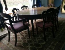 A mahogany D-end extending dining table with reeded underskirt, on reeded tapering legs,