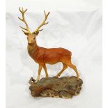 A Beswick model of a stag modelled on a naturalistic base, No.
