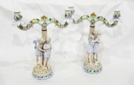 A pair of German porcelain two-branch figural candelabra by Ernst, Bohne & Sohne,