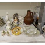 A Belleek vase of bulbous form, decorated with clover leaves,