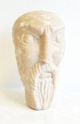 An alabaster or marble carved bust of bearded man, possibly Middle Eastern,