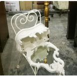 A white painted toilet mirror with floral and scroll engraving,