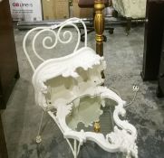 A white painted toilet mirror with floral and scroll engraving,