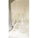 A set of four glasses with tall air-twist stems,