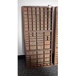 A set of wooden specimen shelves