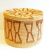 An African woven circular basket with lid,