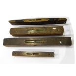 Four antique brass bound wooden levels