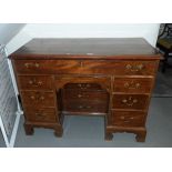 Georgian style mahogany kneehole desk with single frieze drawer,