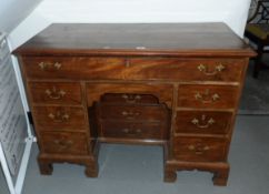 Georgian style mahogany kneehole desk with single frieze drawer,
