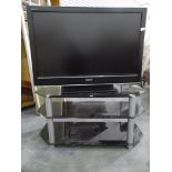 A Sony Bravia flatscreen television with stand