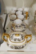 A Spode part coffee set decorated with bands of oak and vine,