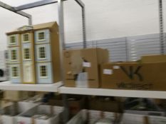 A kit built doll's house with quantity of furniture and accessories (2 boxes)