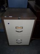 A metal Bisley two drawer filing cabinet