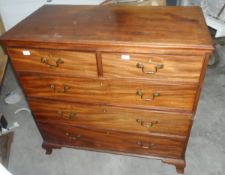 A mahogany chest of two short and three long graduated drawers, with swan neck handles,