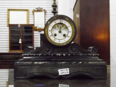 Victorian Black slate mantel clock with drum-shaped case and brocot escapement